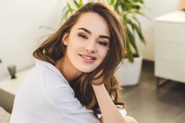 depositphotos_183144796-stock-photo-portrait-smiling-pretty-woman-bathrobe